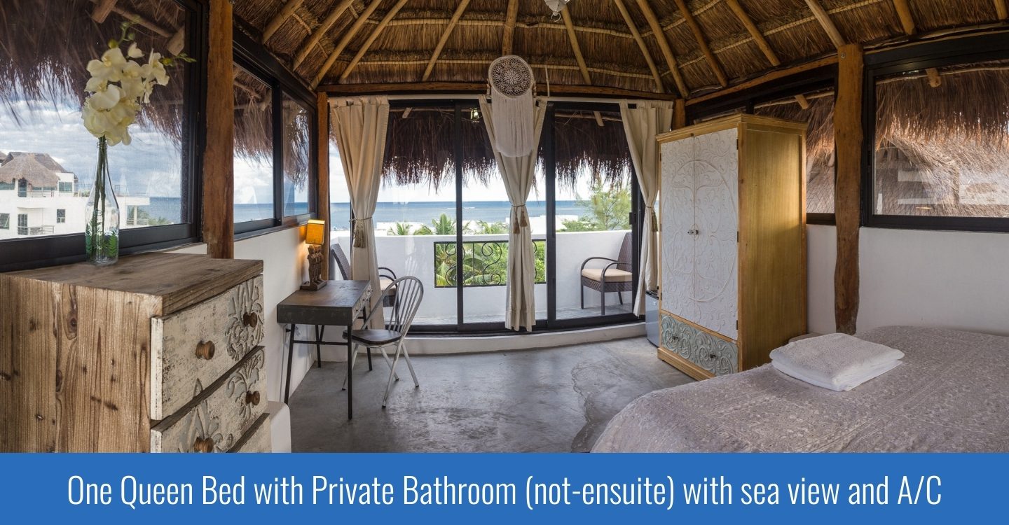 Private queen palapa room with ocean-view balcony