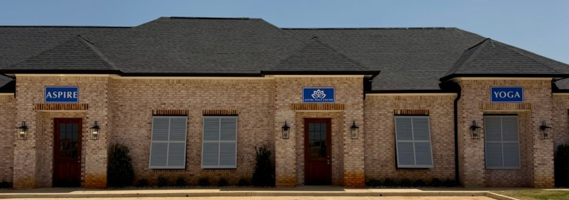 Aspire Yoga Center's new building at Cane's Landing in North Bossier, with ASPIRE and YOGA signage